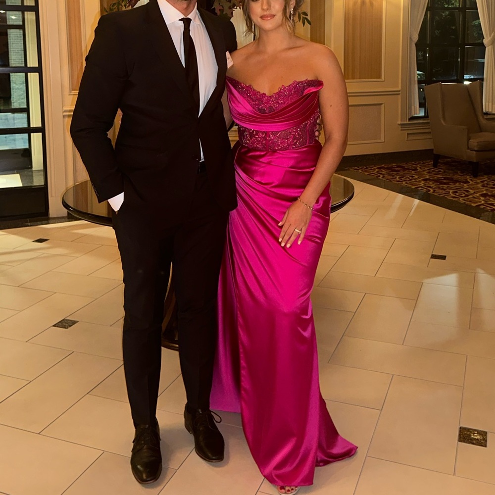 Beautiful Strapless Fuchsia gown with train